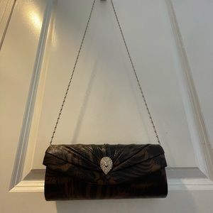 Brown and black evening clutch